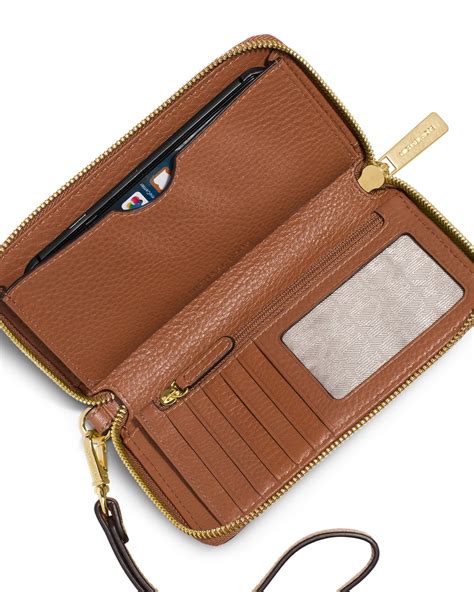 cell phone wallet michael kors|Michael Kors Wallet real.